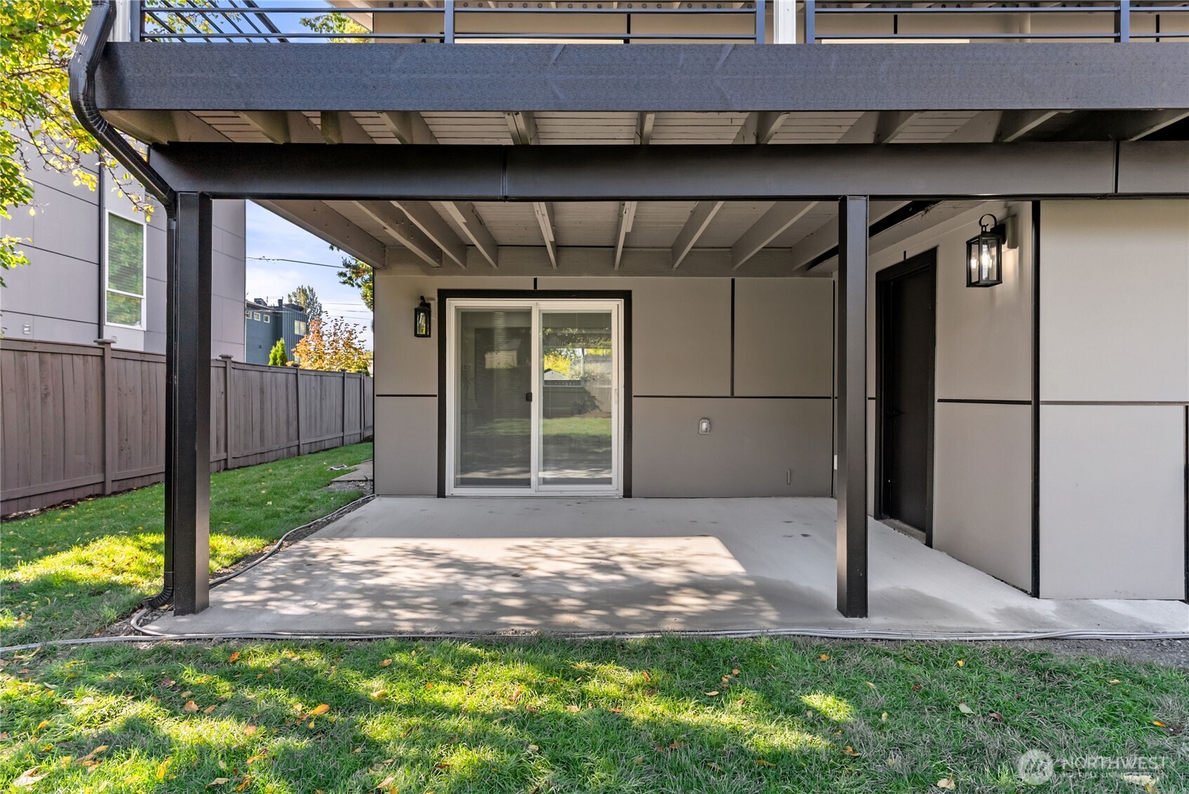 9548 3rd Avenue Northwest Seattle, WA 98117 - Photo 34 of 40 a white house that has tree in front of it