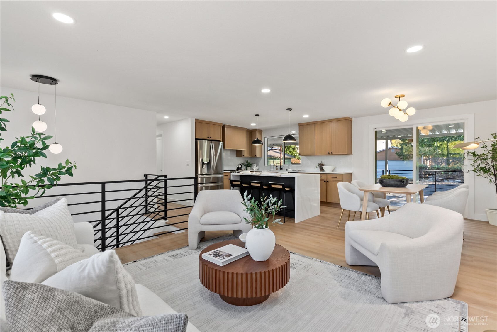 9548 3rd Avenue Northwest Seattle, WA 98117 - Photo 8 of 40 a living room with furniture and a fireplace
