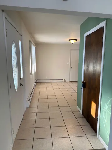 a view of a livingroom with windows