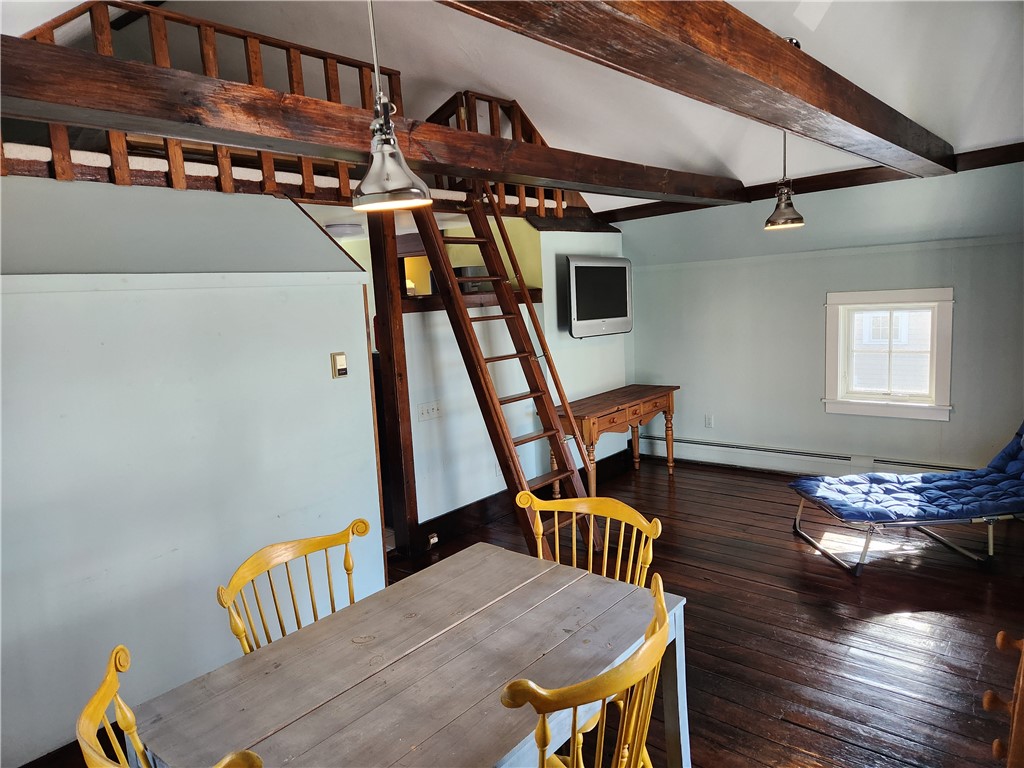 8 Atlantic Avenue Narragansett, RI 02882 - Photo 4 of 11 Charm galore with cathedral ceilings, wooden beams and loft