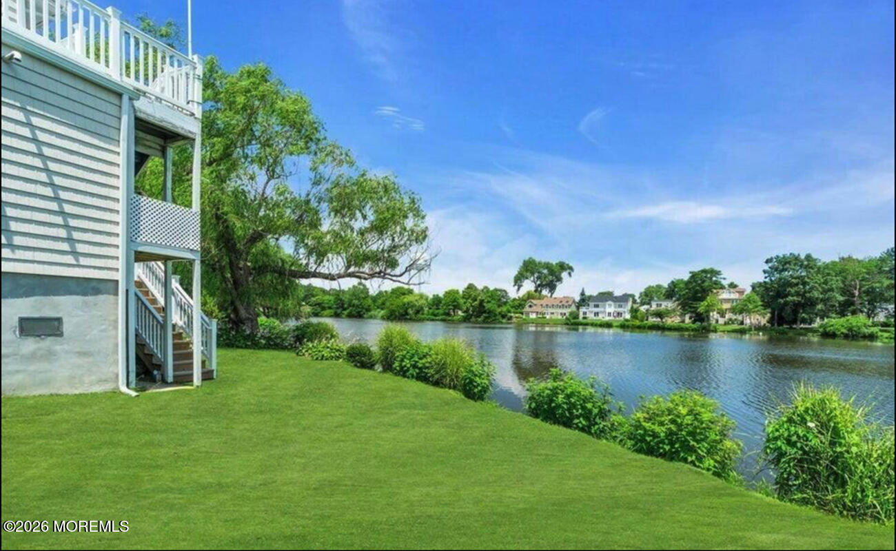 400 Ocean Road Spring Lake, NJ 07762 - Photo 6 of 38 SideYardFacingPond