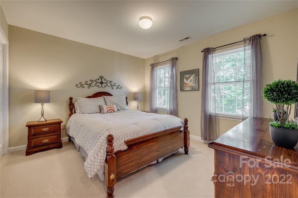 29008 Silver Fox Drive Tega Cay, SC 29708 - Photo 29 of 48 a bedroom with a bed and window