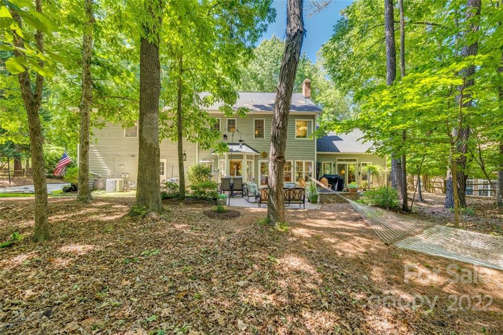 29008 Silver Fox Drive Tega Cay, SC 29708 - Photo 41 of 48 a view of a house with a tree in the background