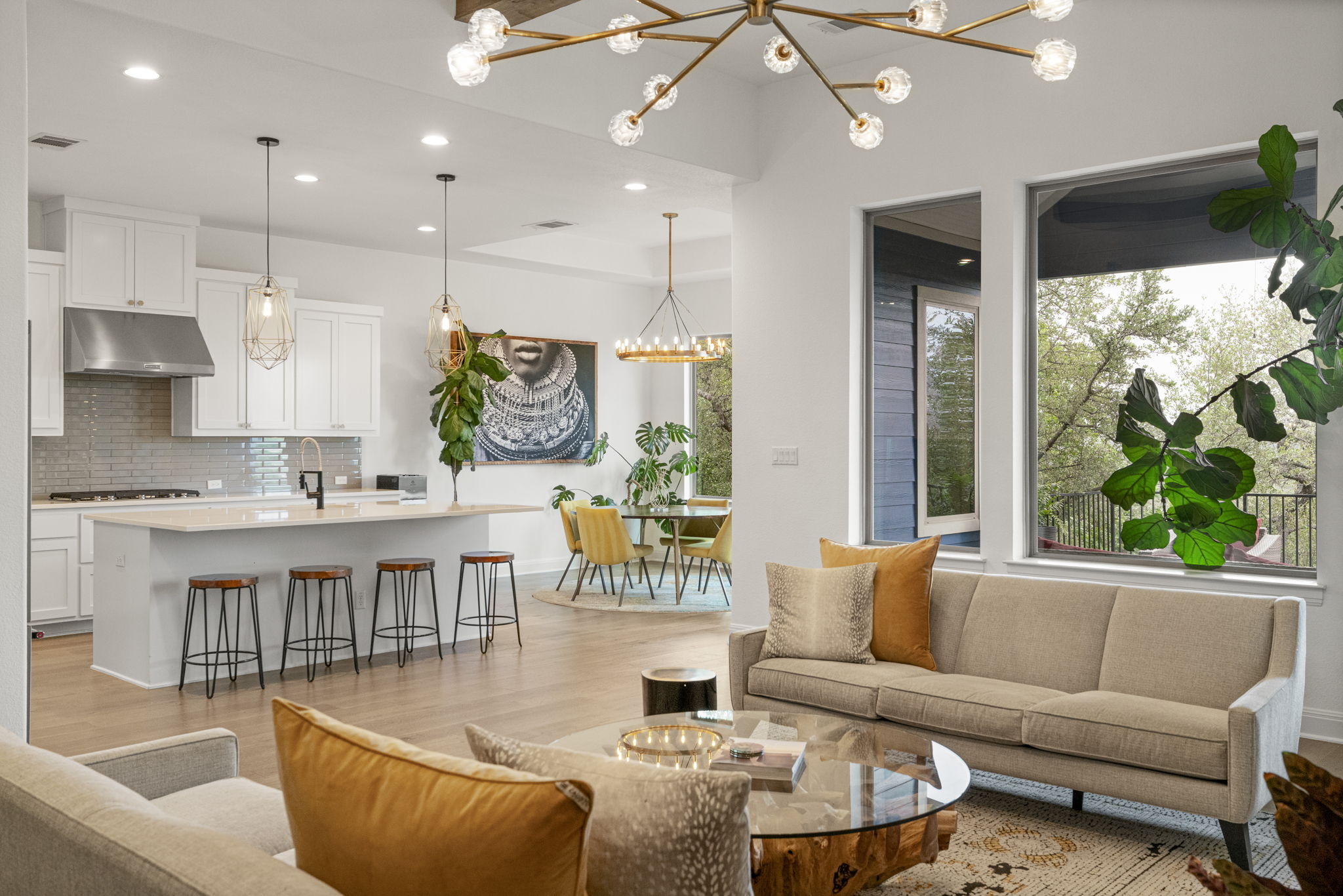 288 Hazy Hills Loop Dripping Springs, TX 78620 - Photo 14 of 40 The room's scale allows for multiple seating arrangements while maintaining a strong connection to the kitchen and outdoor living.