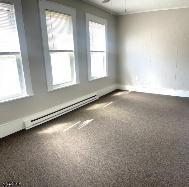 80 Main Street, Unit 3 Franklin, NJ 07416 - Photo 2 of 9 an empty room with windows