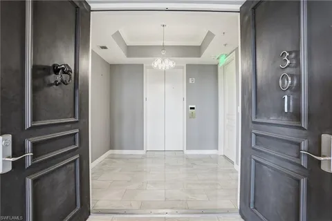 a view of a hallway view with staircase