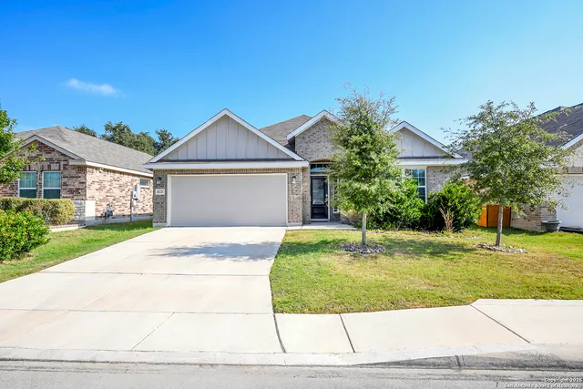 a house with garden in front of it