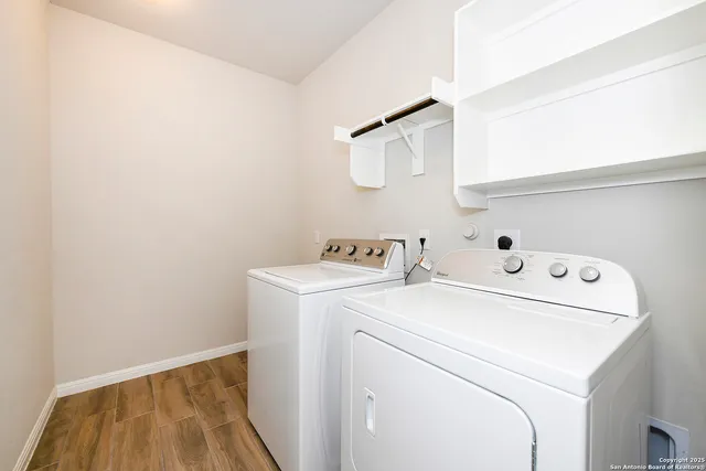 a utility room with dryer and washer