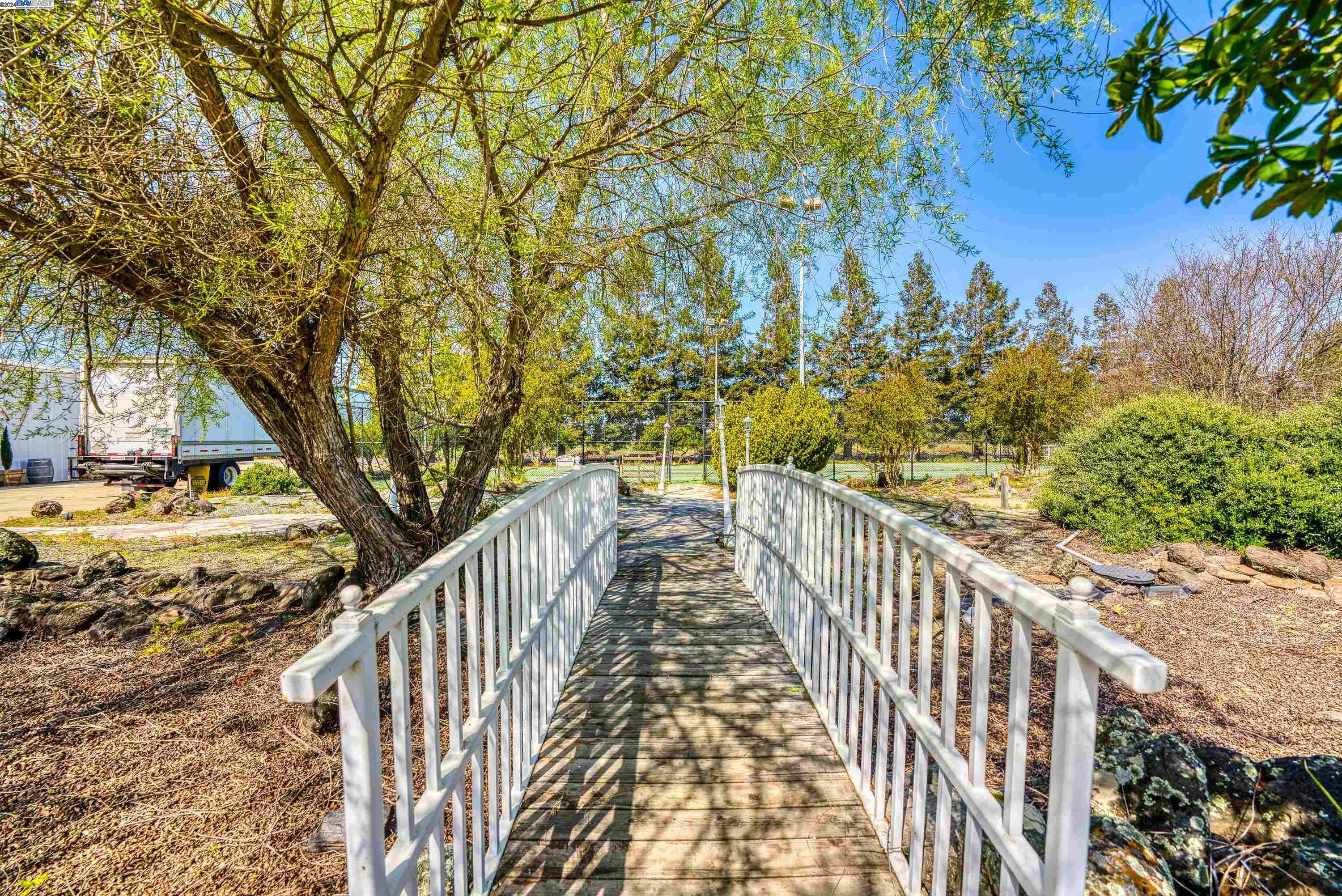 11699 Conley Road Galt, CA 95632 - Photo 11 of 31 a view of a balcony with wooden fence