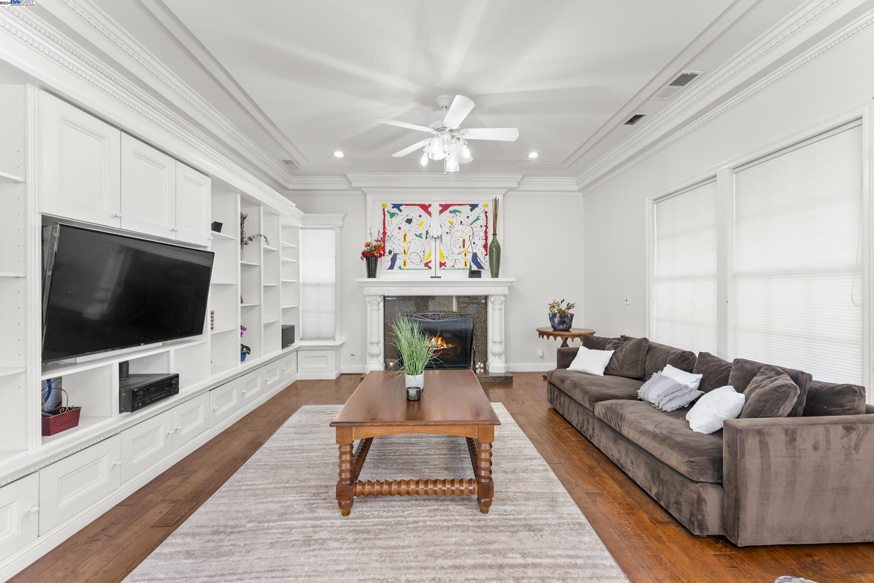 11699 Conley Road Galt, CA 95632 - Photo 14 of 31 a living room with furniture and a flat screen tv