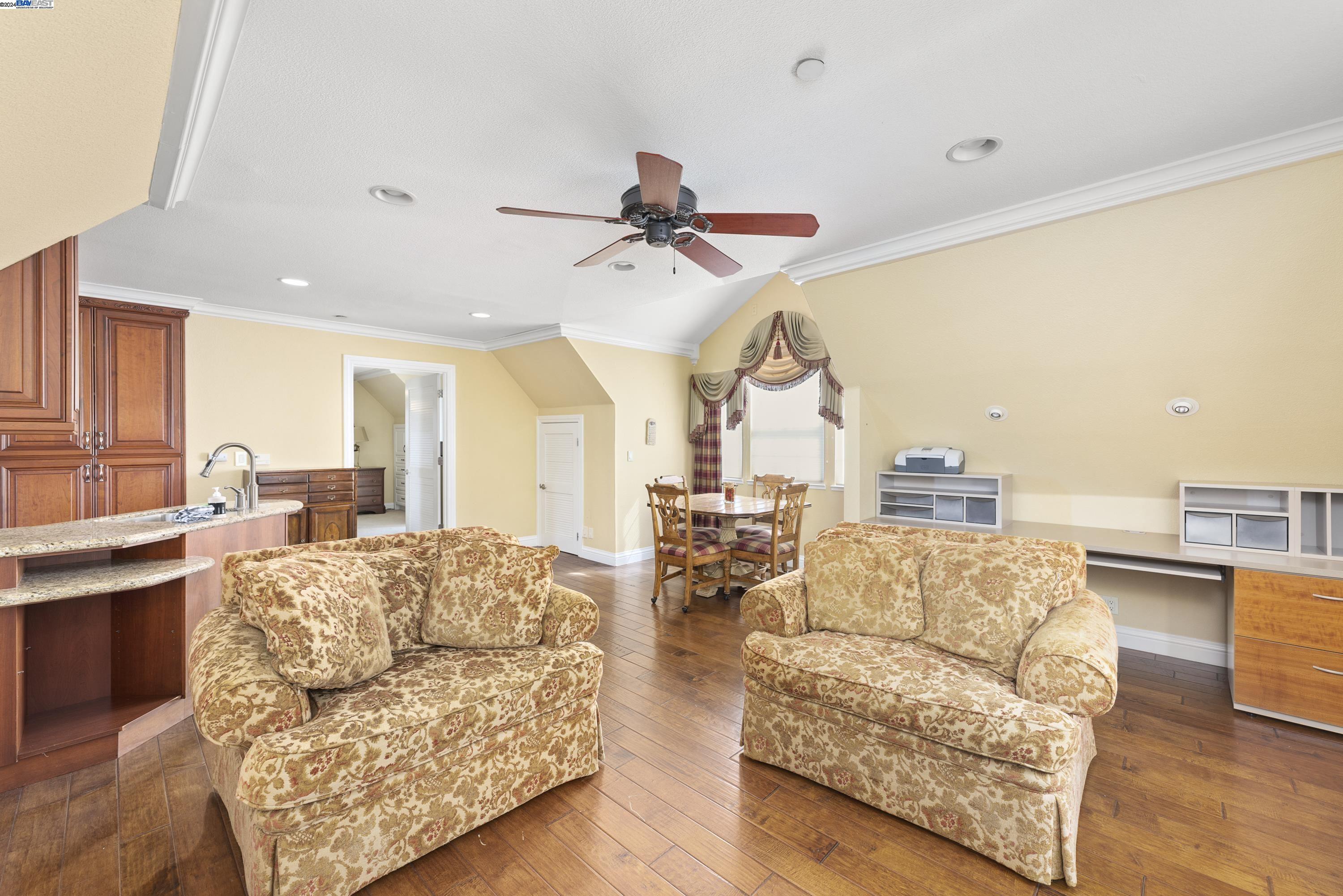 11699 Conley Road Galt, CA 95632 - Photo 23 of 31 a living room with furniture and a large window