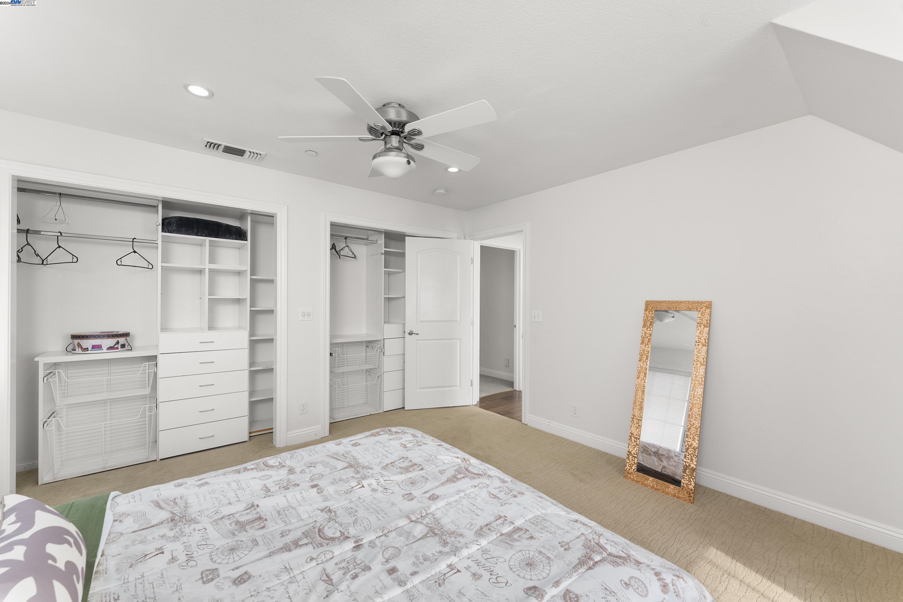 11699 Conley Road Galt, CA 95632 - Photo 27 of 31 a bedroom with a bed and a dresser