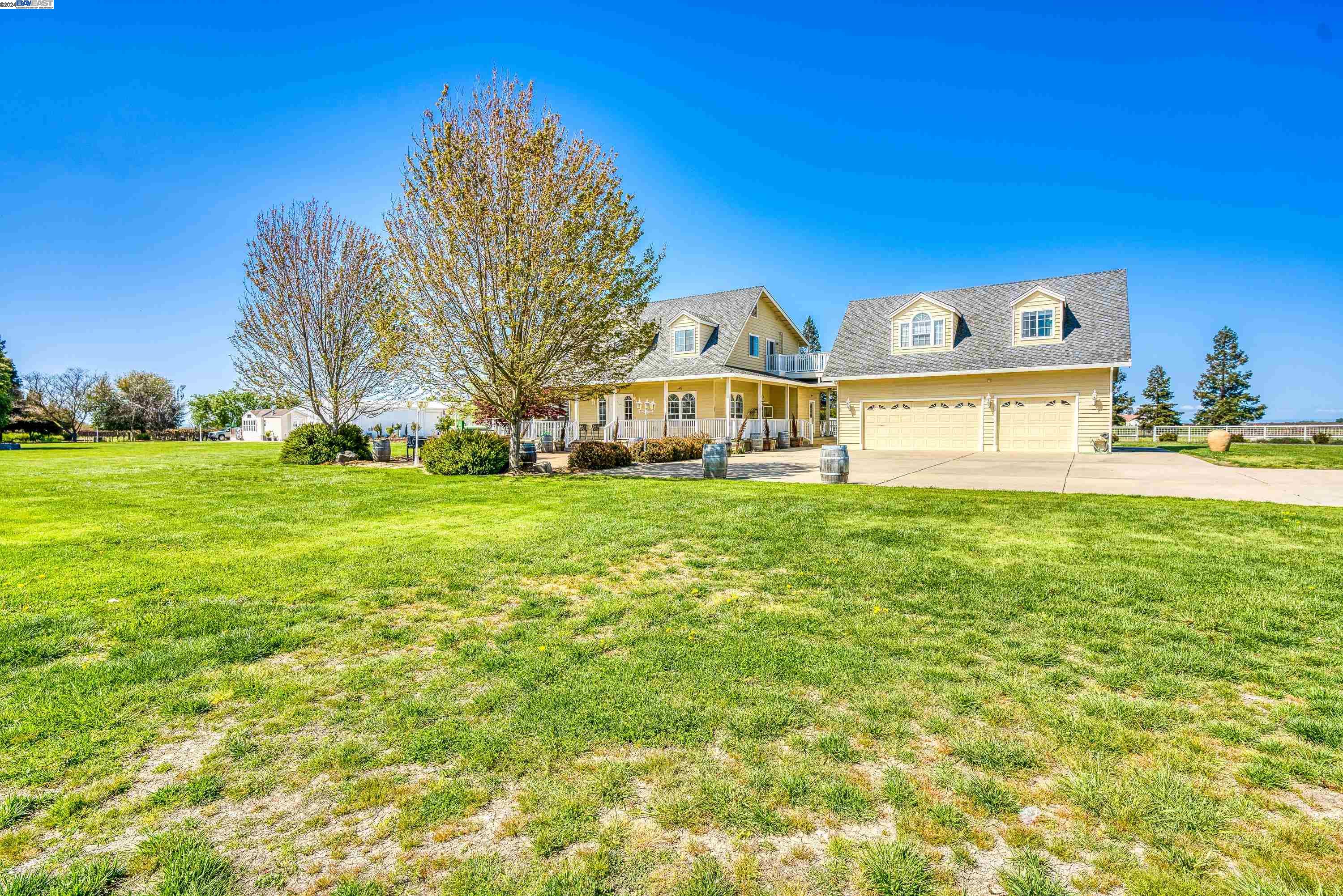 11699 Conley Road Galt, CA 95632 - Photo 31 of 31 a view of yard with swimming pool and green space