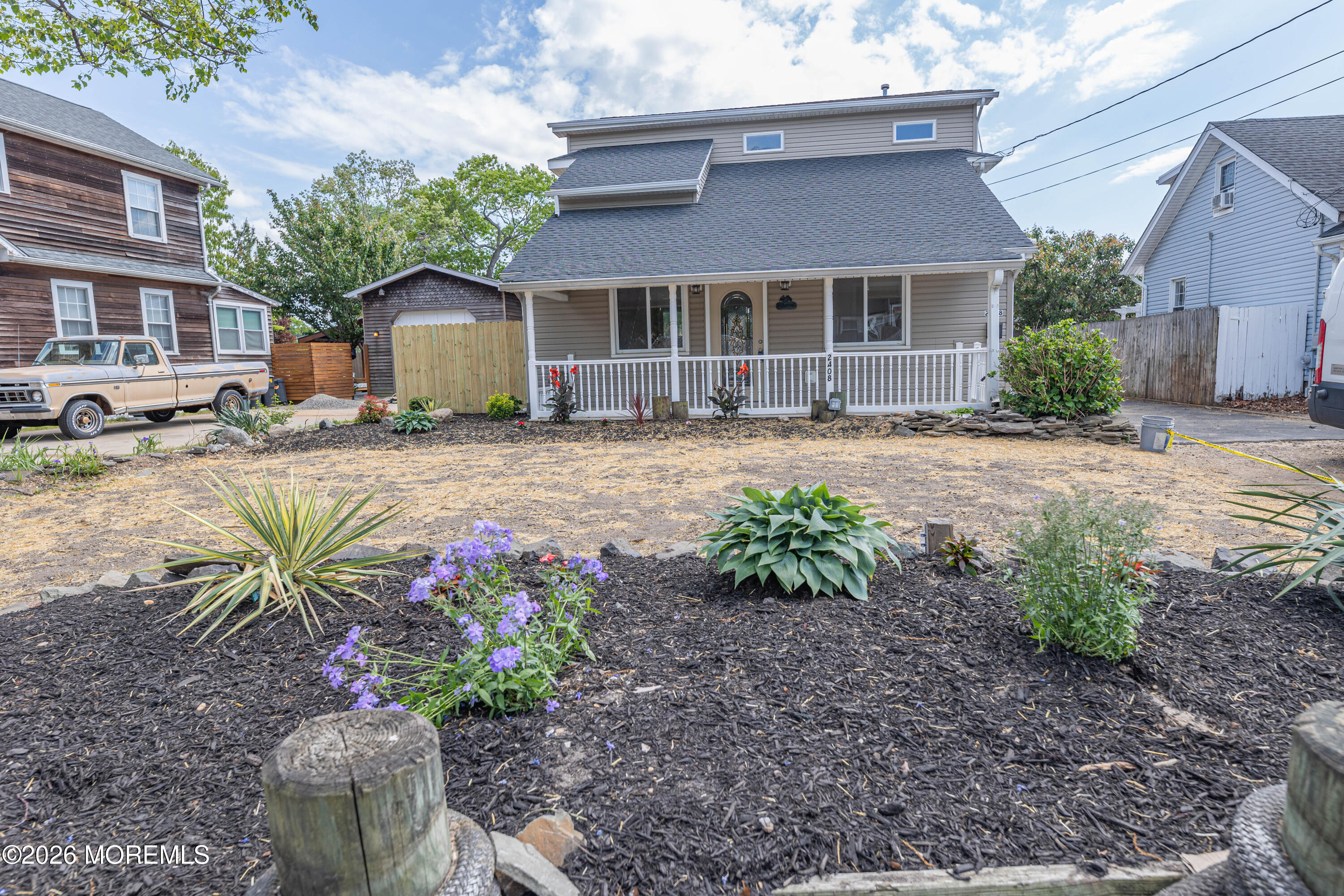2408 Herbertsville Road Point Pleasant, NJ 08742 - Photo 67 of 82 a front view of a house with a yard