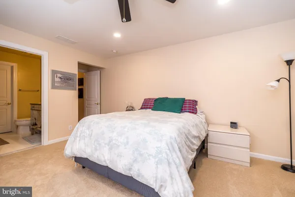 a view of a living room and floor to ceiling window or kitchen