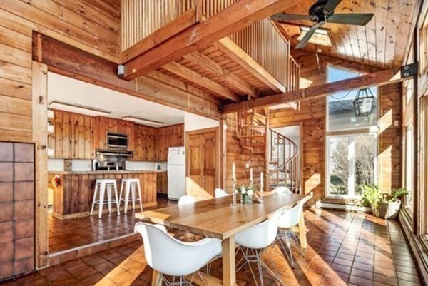 12 Mitchell Avenue Scituate, MA 02066 - Photo 19 of 30 a view of a dining room with furniture wooden floor and a chandelier