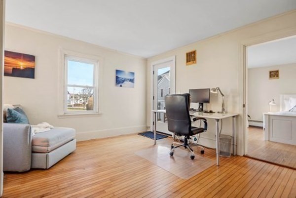 12 Mitchell Avenue Scituate, MA 02066 - Photo 22 of 30 a view of a workspace with furniture and a bedroom
