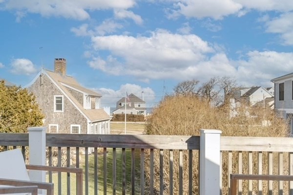 12 Mitchell Avenue Scituate, MA 02066 - Photo 26 of 30 a view of a balcony with wooden fence