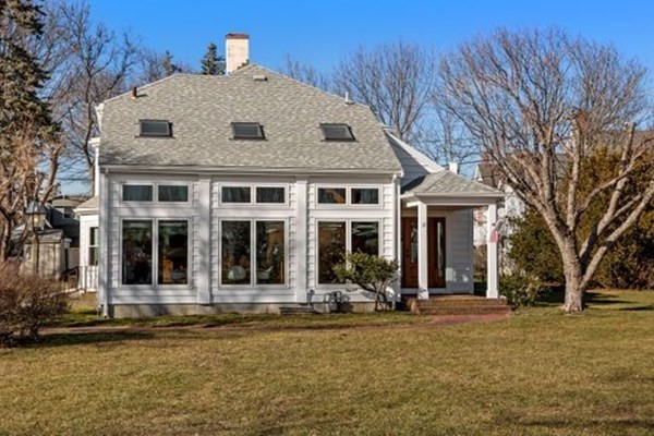 12 Mitchell Avenue Scituate, MA 02066 - Photo 3 of 30 a front view of a house with a yard
