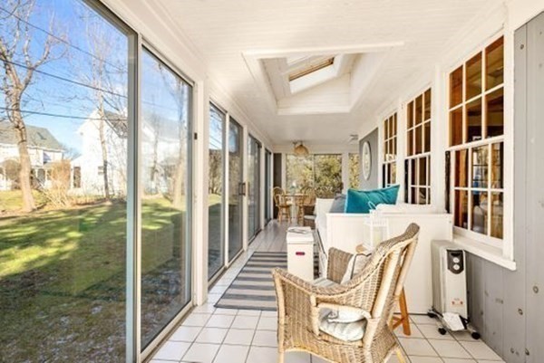 12 Mitchell Avenue Scituate, MA 02066 - Photo 10 of 30 a view of an chairs and tables in the balcony