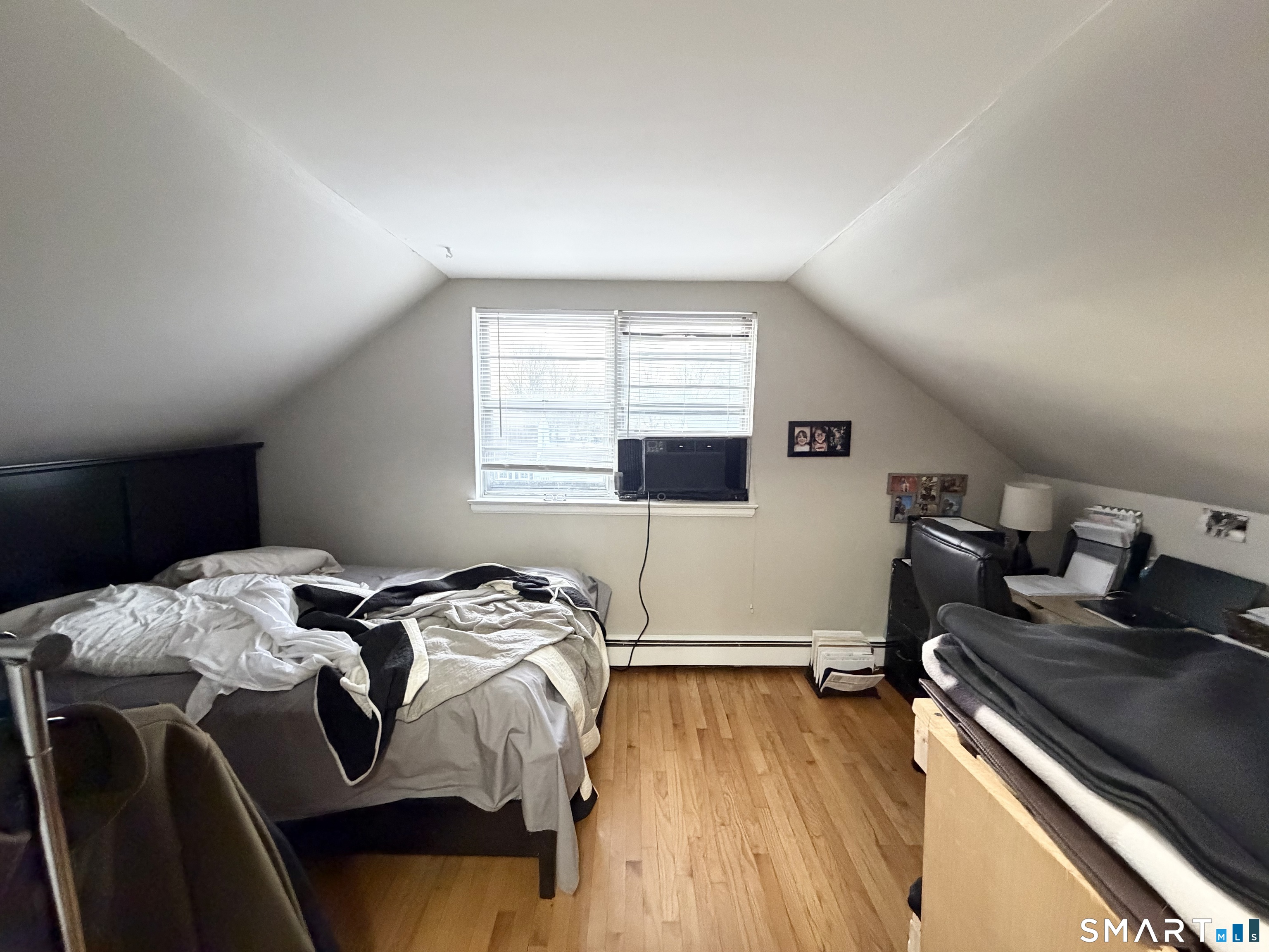 100 Upton Street, Unit 5 New Britain, CT 06051 - Photo 5 of 6 a bedroom with bed and a window