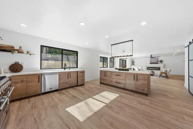 a view of a dining room with furniture and window