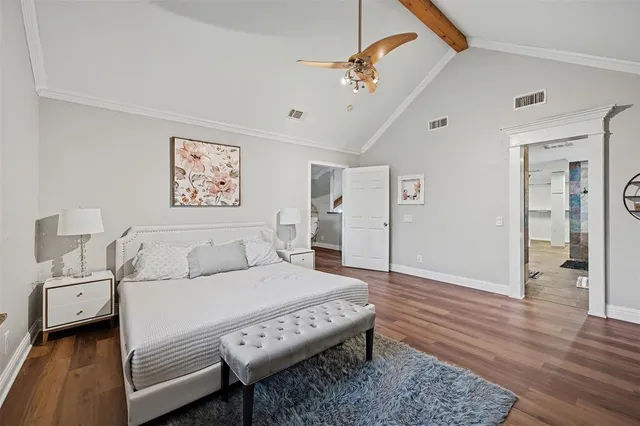 a bathroom with a granite countertop tub sink and mirror