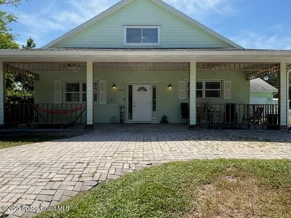 a view of a house with a patio