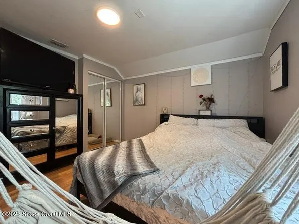 a kitchen with stainless steel appliances granite countertop a refrigerator a stove and a sink