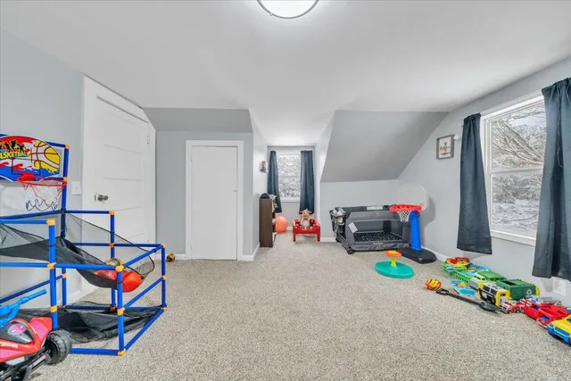 a children room with toys and a couch