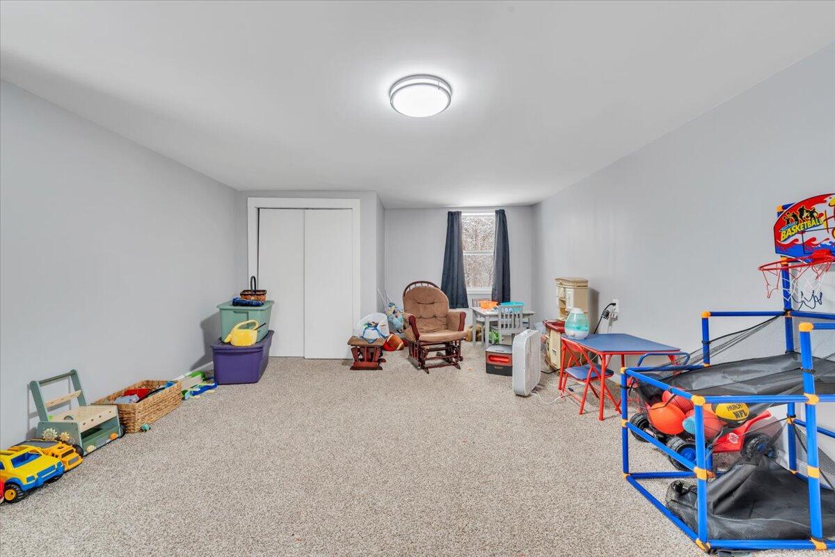 1178 Preston Mill Road Huddleston, VA 24104 - Photo 20 of 28 a children room with toys and a couch