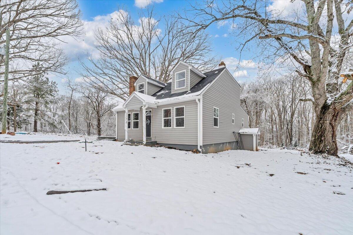 1178 Preston Mill Road Huddleston, VA 24104 - Photo 28 of 28 a view of white house with a snow of the yard