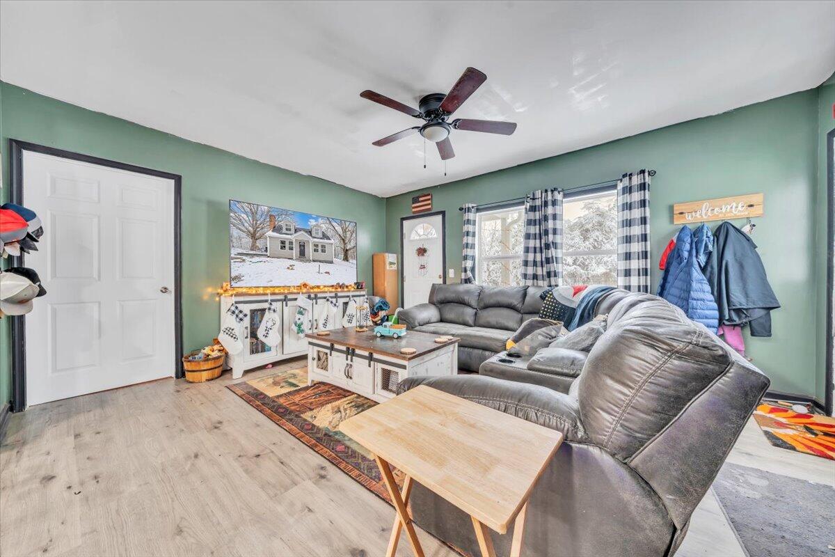 1178 Preston Mill Road Huddleston, VA 24104 - Photo 3 of 28 a living room with furniture a rug and a large window