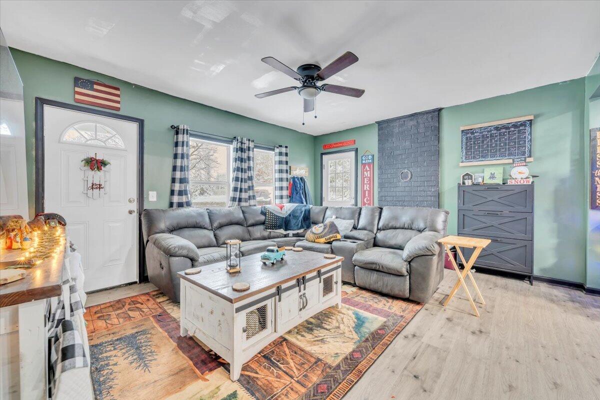 1178 Preston Mill Road Huddleston, VA 24104 - Photo 5 of 28 a living room with furniture a ceiling fan and a rug