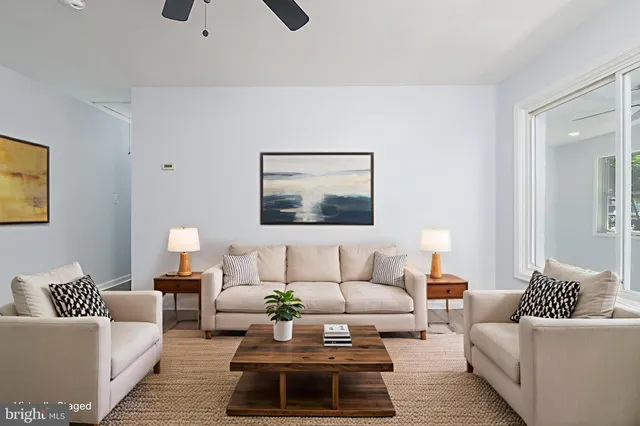 a living room with furniture and a couch