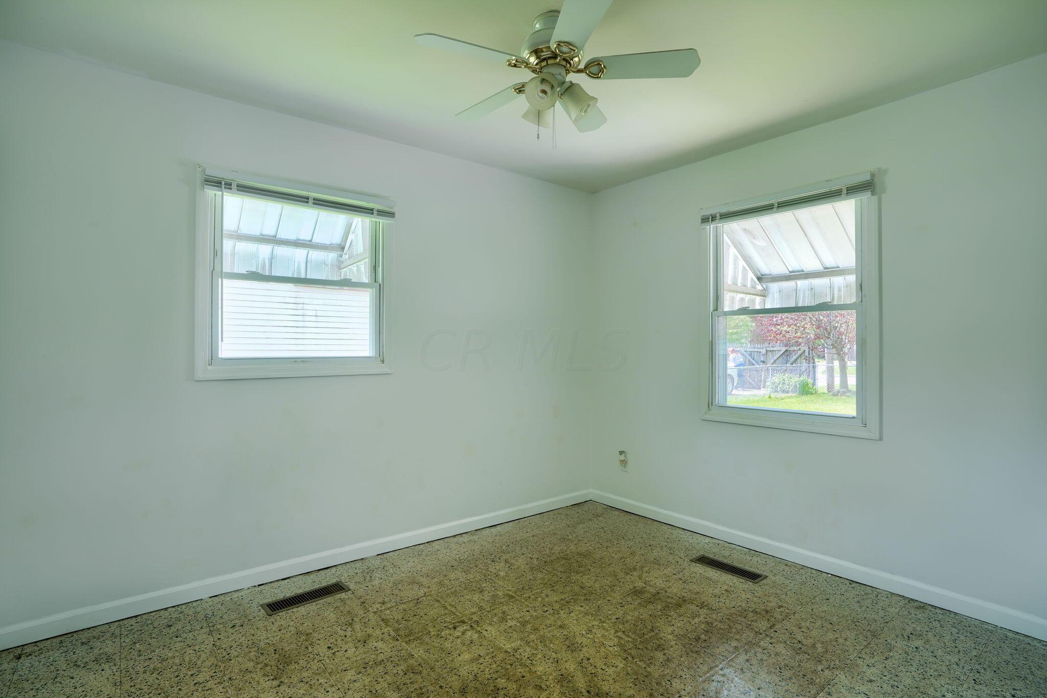 909 Exeter Road Columbus, OH 43213 - Photo 21 of 38 Bedroom 2 faces back.