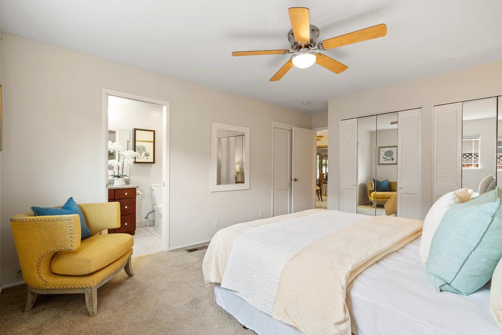 1121 Yorkshire Drive Cupertino, CA 95014 - Photo 14 of 30 a bedroom with a bed and a couch