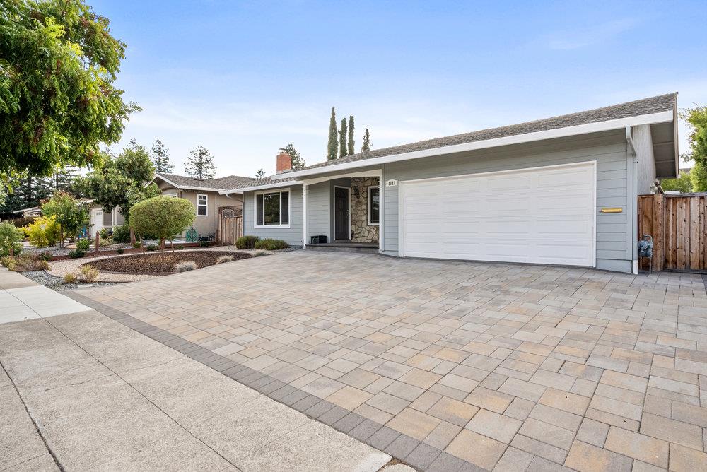 1121 Yorkshire Drive Cupertino, CA 95014 - Photo 2 of 30 a front view of a house with a yard