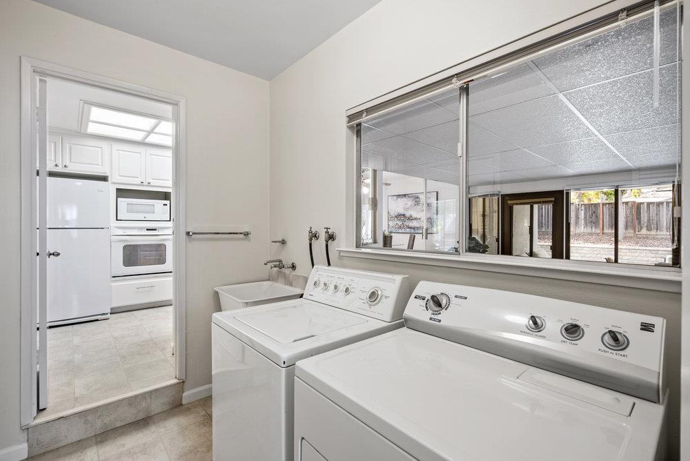 1121 Yorkshire Drive Cupertino, CA 95014 - Photo 21 of 30 a utility room with dryer and washer