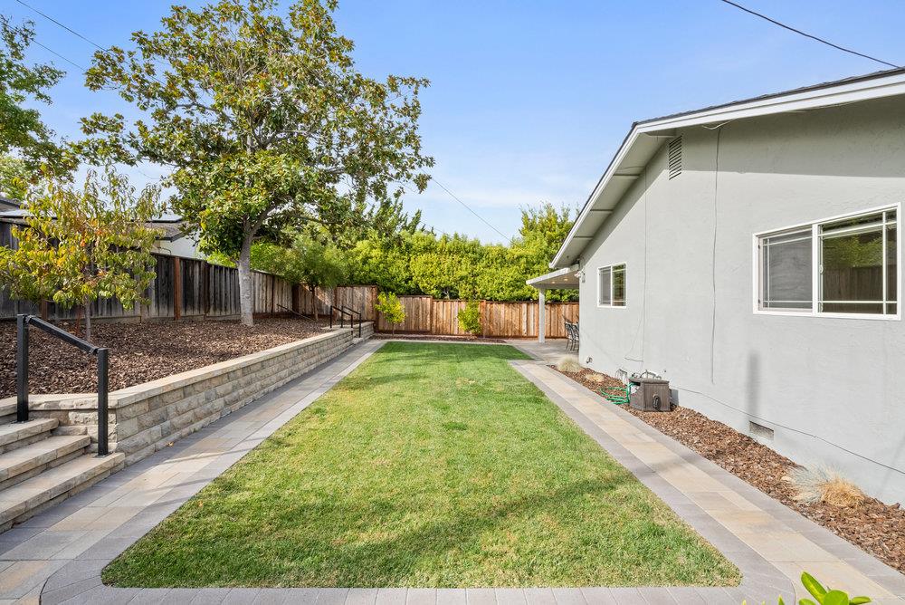 1121 Yorkshire Drive Cupertino, CA 95014 - Photo 26 of 30 a view of a backyard with a white house