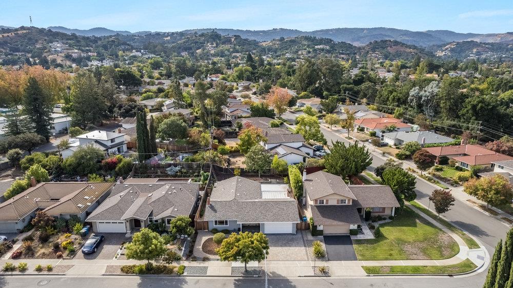 1121 Yorkshire Drive Cupertino, CA 95014 - Photo 27 of 30 an aerial view of a house with a mountain