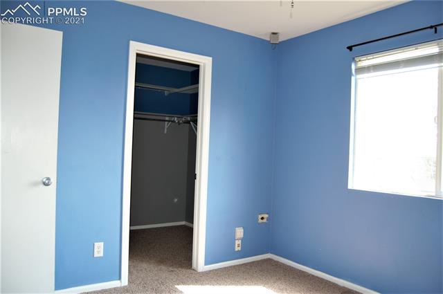 7560 Coffee Road Peyton, CO 80831 - Photo 17 of 17 Walk in closet in bedroom 3