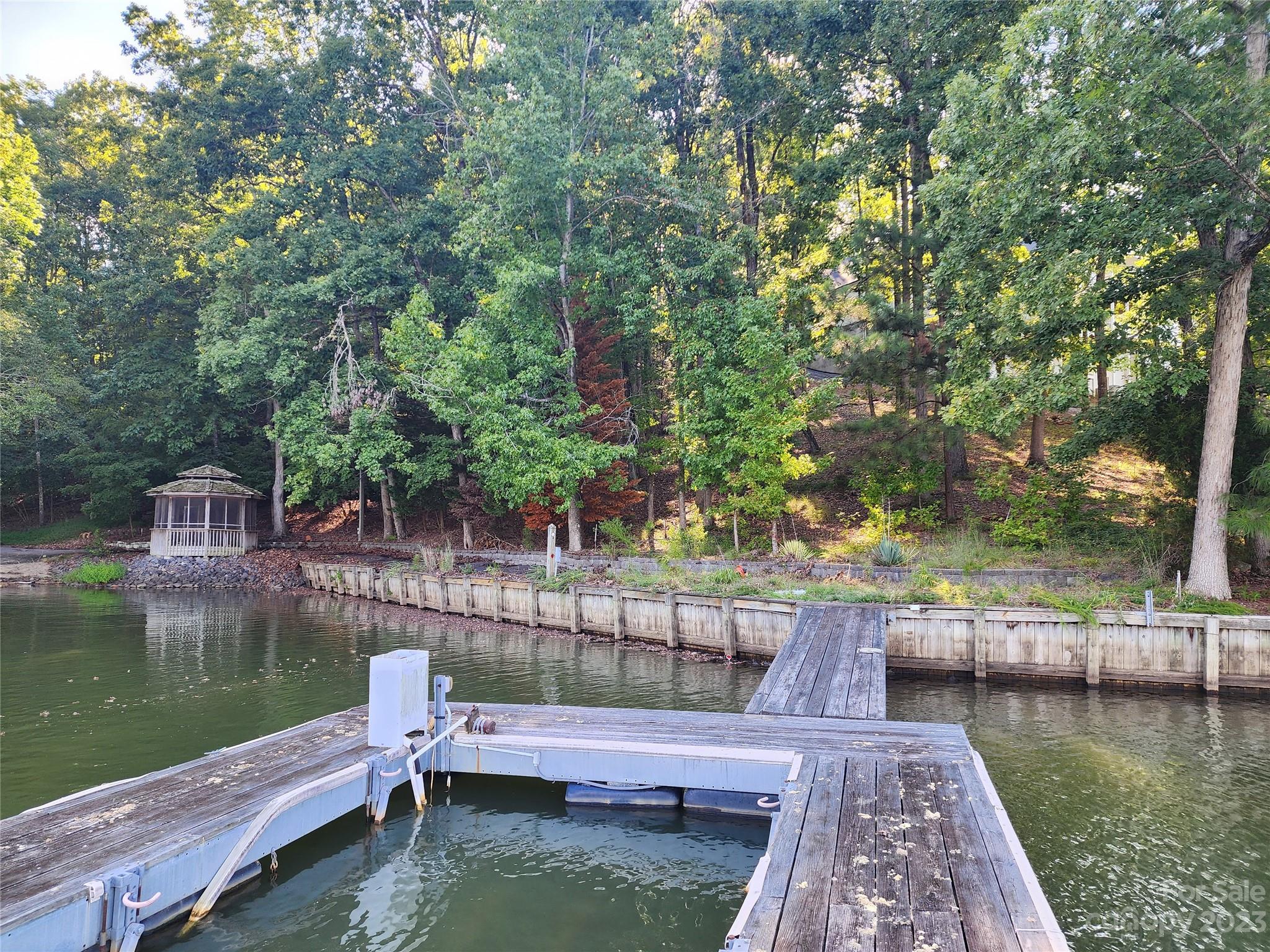 16004 Munson Hill Road Charlotte, NC 28278 - Photo 5 of 12 a view of a house with a lake view