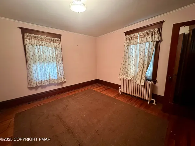 an empty room with windows