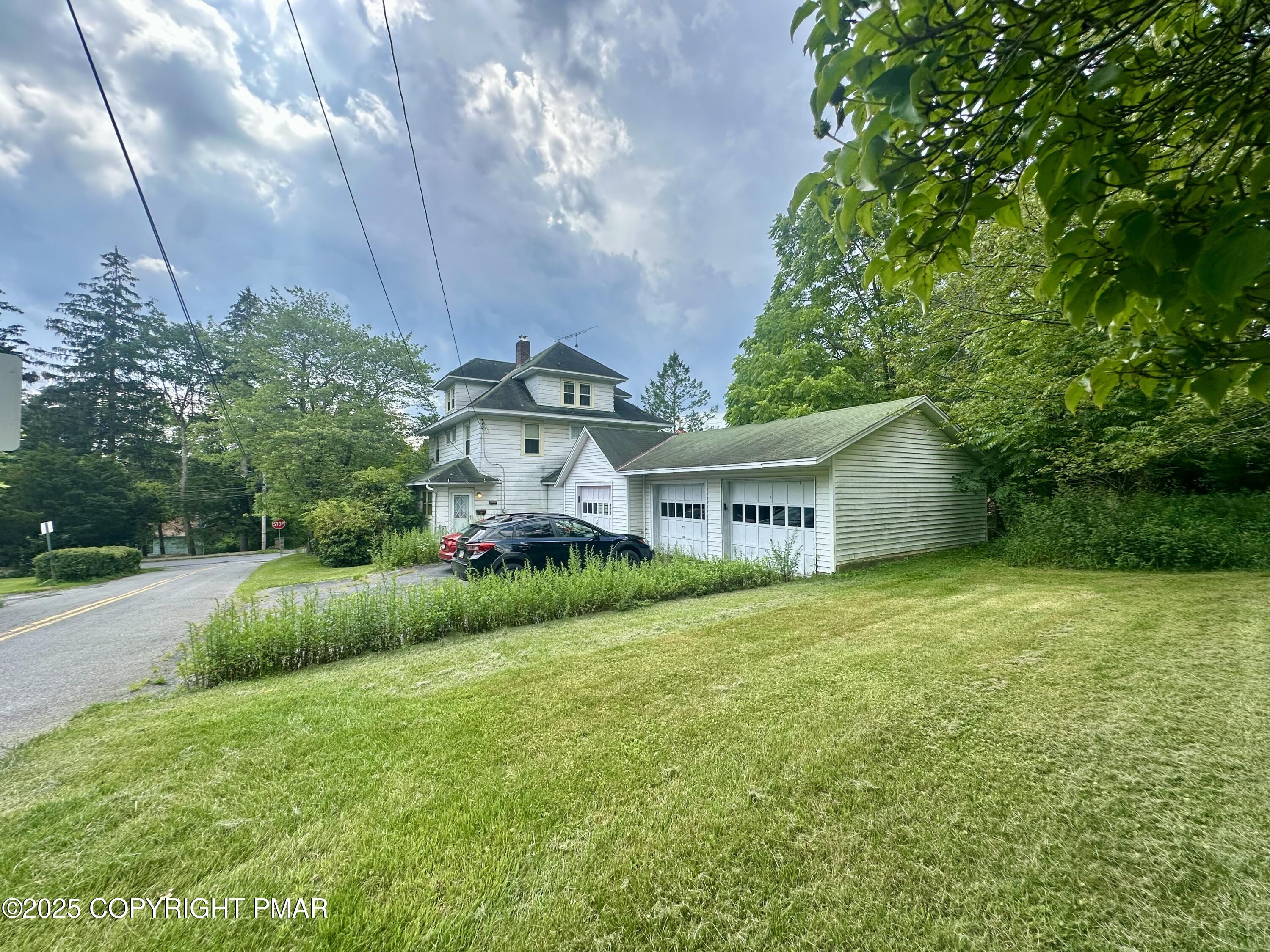 22 Fairview Avenue Mount Pocono, PA 18344 - Photo 21 of 22 a front view of a house with garden