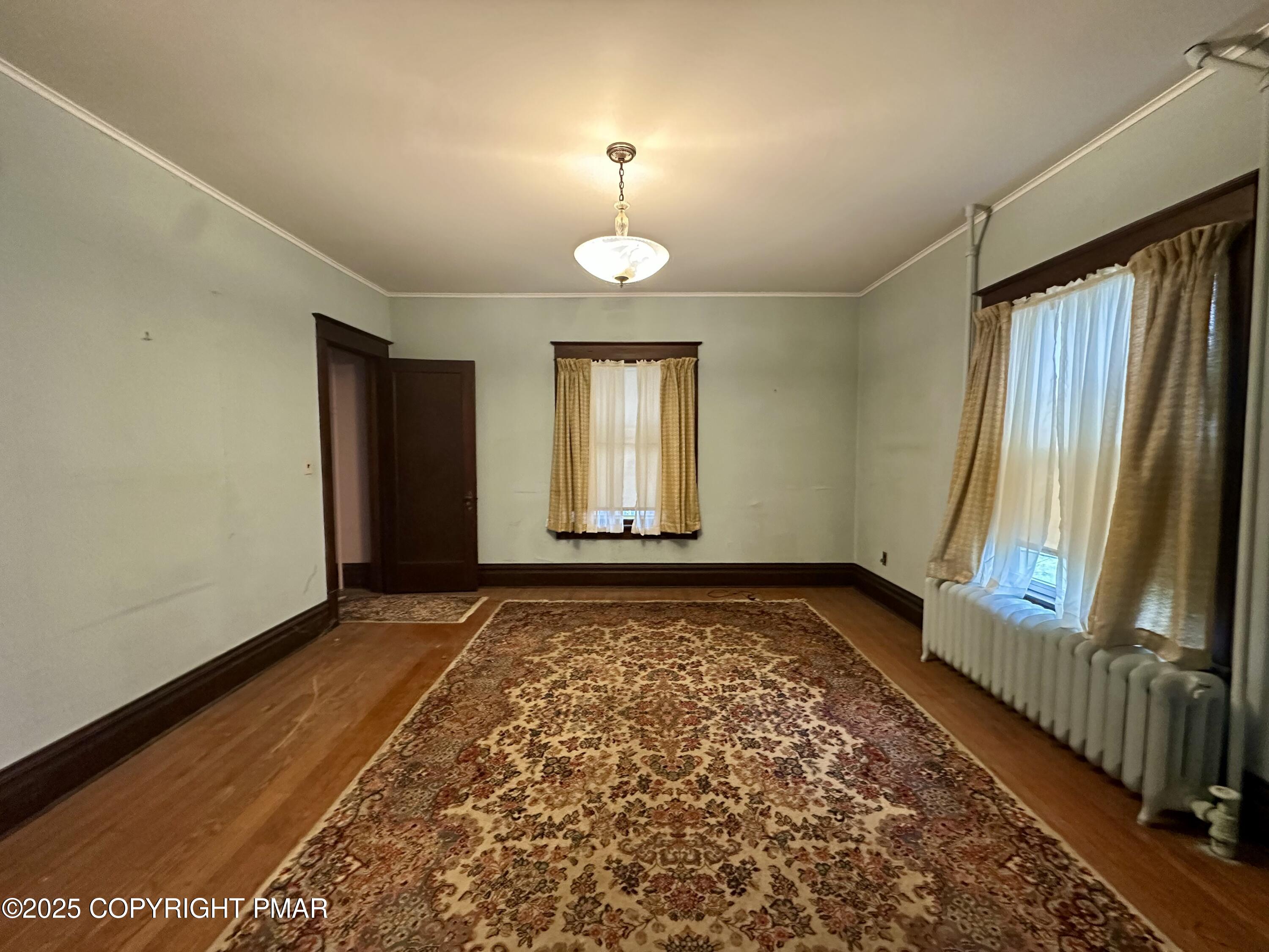 22 Fairview Avenue Mount Pocono, PA 18344 - Photo 7 of 22 wooden floor in an empty room with a window