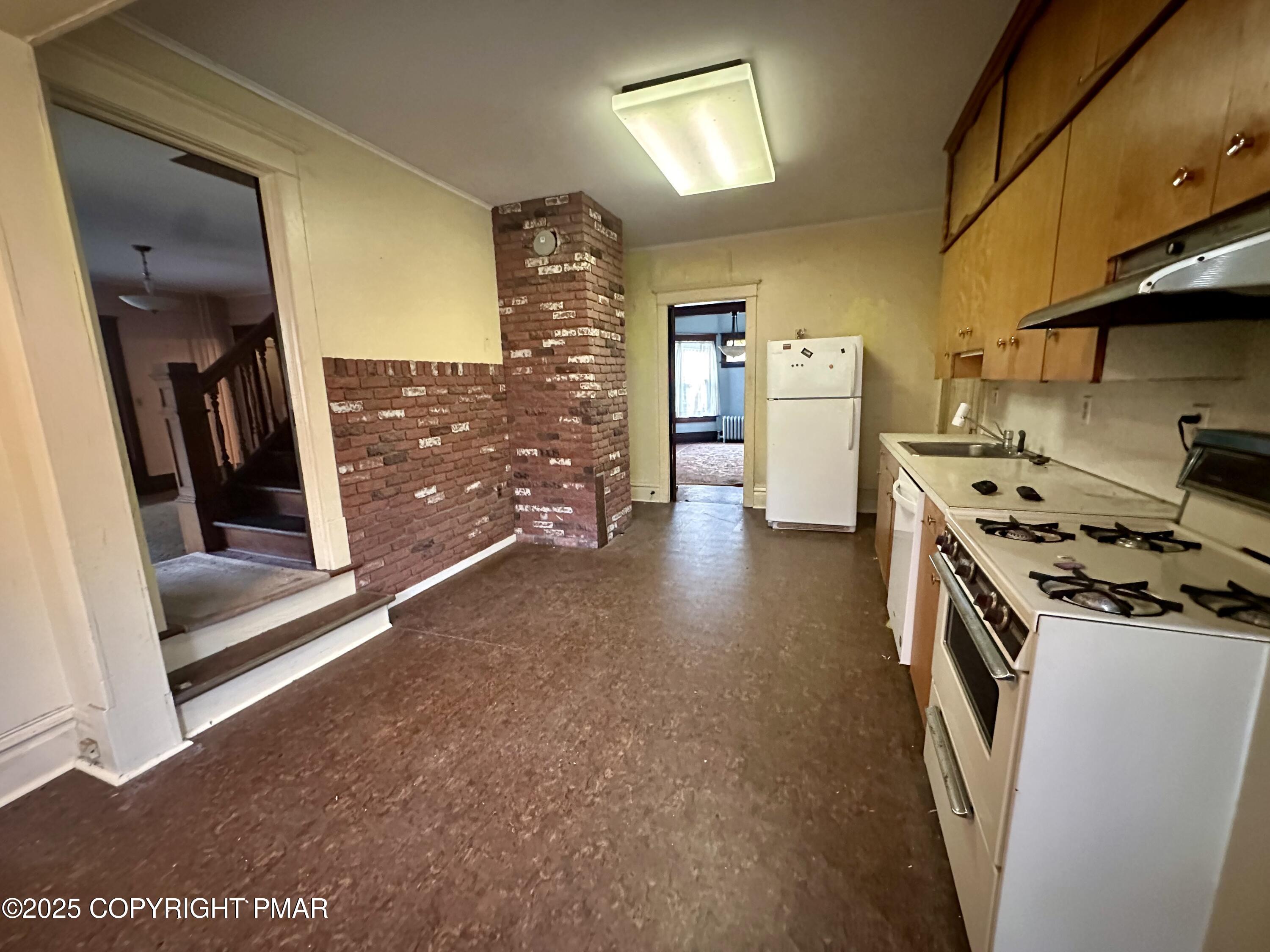 22 Fairview Avenue Mount Pocono, PA 18344 - Photo 9 of 22 a kitchen with stainless steel appliances granite countertop a stove a sink and a refrigerator