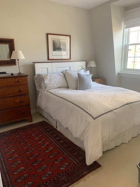 341 Beacon Street, Unit 5A Boston, MA 02116 - Photo 4 of 9 a bedroom with a bed and a window