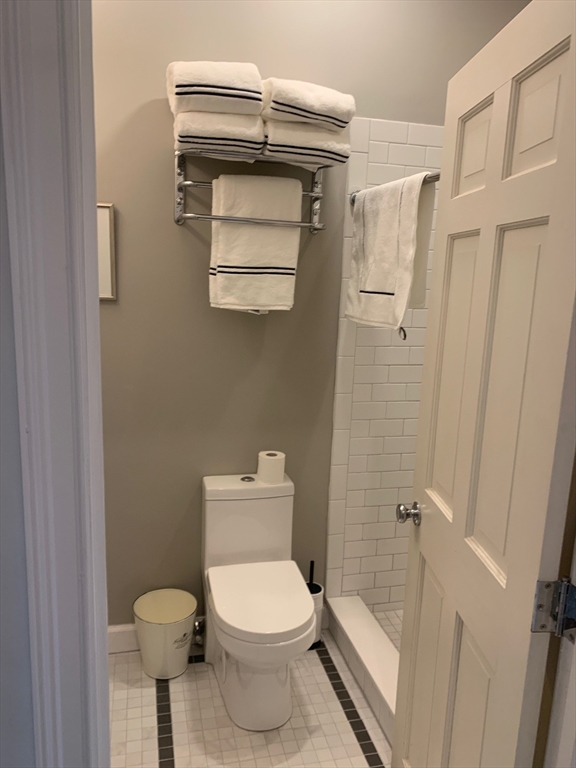 341 Beacon Street, Unit 5A Boston, MA 02116 - Photo 5 of 9 a bathroom with a toilet and a shower