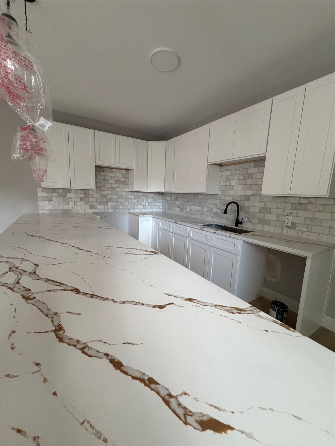 9914 Fillmore Street Houston, TX 77029 - Photo 5 of 11 a kitchen with granite countertop a sink stainless steel appliances and cabinets